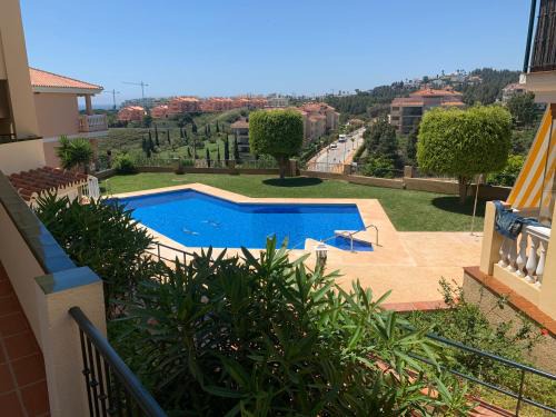 El Faro Apartment | Apartamento con jardín y piscina en el faro de calaburras