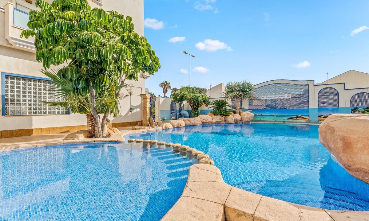 La Regia Apartment | Apartment 'Mandarín Playamarina 2' with Shared Pool, Wi-Fi and Air Conditioning