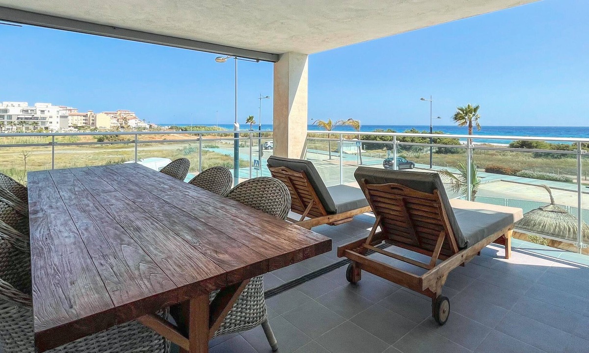 El Morche Apartment | Bright Beach Apartment with Sea and Mountain Views