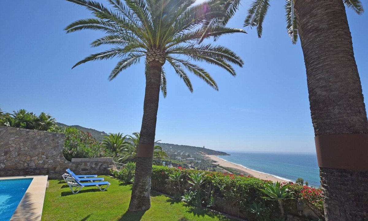 Atlanterra Ski Chalet | Charming rustic villa with sea views in Playa del Faro Camarinal