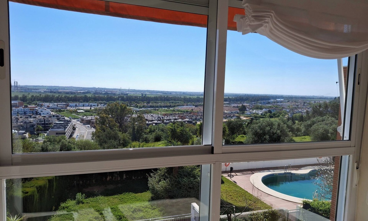 Mairena del Aljarafe Apartment | Spectacular exterior apartment with pool and parking included!