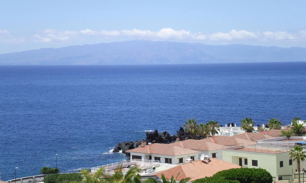 Santiago del Teide Apartment | Tenerife, La Arena Beach 300 m away, free Wi-Fi, community pool