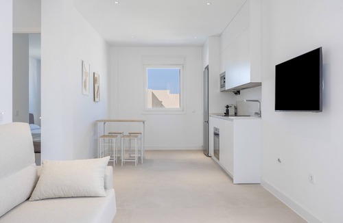 Poblado Sancti Petri Apartment | Apartment 'Los Drogos, Building A, Penthouse A' with shared pool, garden and Wi-Fi