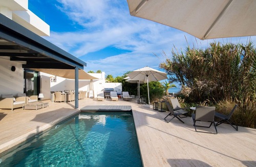 Urbanizacion Costabella Villa | Beachfront Villa with Heated Pool & Spa