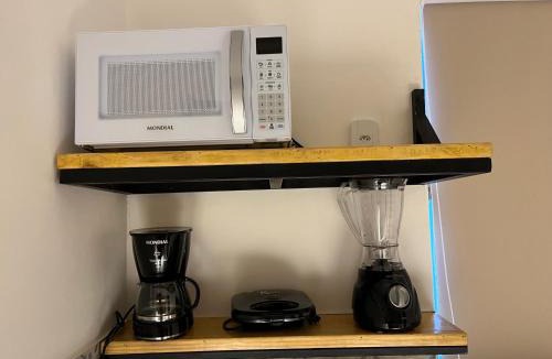 Jardim Ipe Apartment | Flat com ar e varanda com linda vista para o Ibituruna, Wi-Fi - Véu de Noiva 204