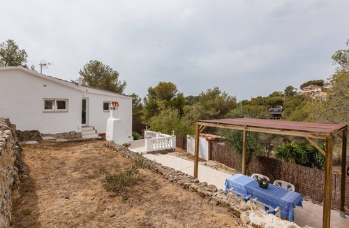 Canyelles House | Holiday Home "Casita Palmeras" with Mountain Views, Private Garden and Wi-Fi