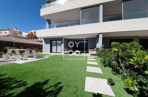 Punta Prima Apartment | Infinity Blue groundfloor apt, beachfront, heated pool - by OYOOSTAYS
