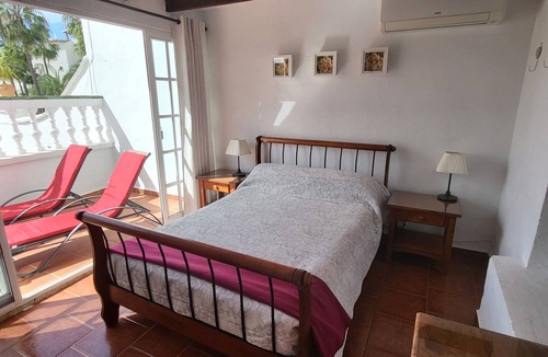 Oasis del Capistrano Apartment | Relax.south facing terrace, all day sun, views of tropical gardens and pools
