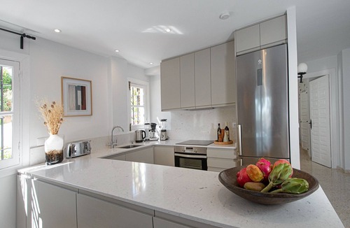 Oasis del Capistrano Apartment | Stay in tropical garden within walking distance to sea and Nerja town