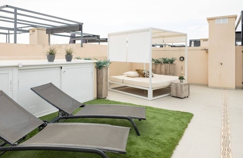 Pueblo Latino Apartment | Stylish penthouse with roof terrace for 4 persons