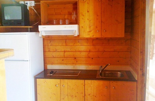 Miami Platja House | Wooden bungalow near beach with pool, parking and pets allowed