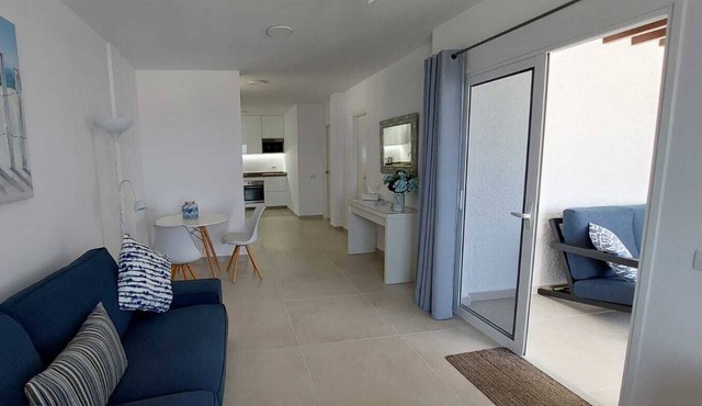 Modern 1 bed in popular Los Gigantes with large terrace with sea & cliff views