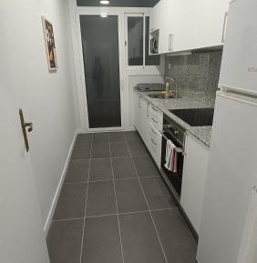 Four-Bedroom Apartment with Balcony 