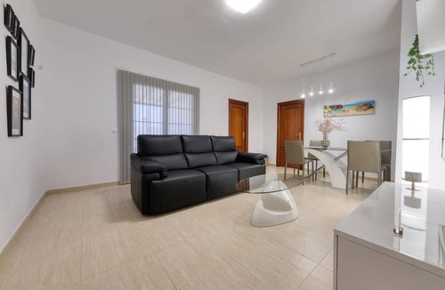 Costa Teguise Apartment | Vacation Apartment 'Casa Yare, Shared Pool, Air-con' with Sea View, Wi-Fi and Air Conditioning