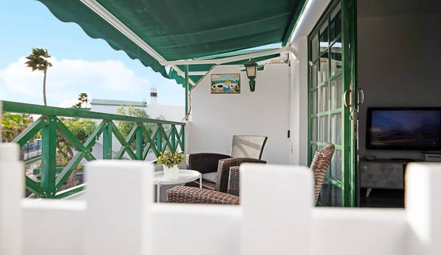 Vacation Apartment 'Los Pocillos' with Mountain View, Shared Pool and Wi-Fi